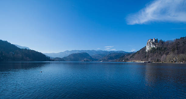 istock Lake scene with a castle on the hill 183757963