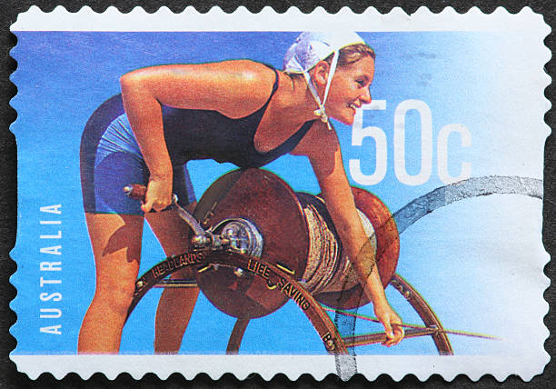Australian woman lifeguard turning a winch
