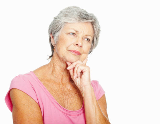 istock Thoughtful senior woman on white background 183759277