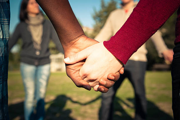 istock Holding hands, multiracial couple in love 183759430