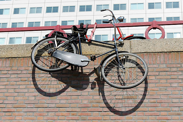 bike thrown over railing by vandals