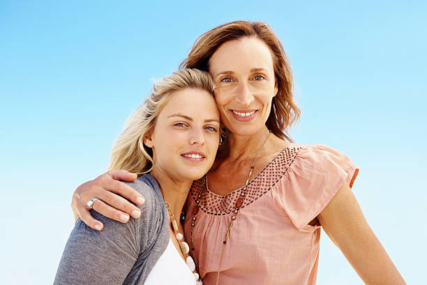 istock Mother and daughter standing together 183760445