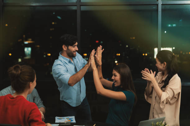 istock Businesspeople giving high five together while coworker clapping hands. Tracery. 1837606832