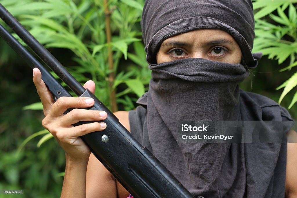 Rivoluzionario donna combattente per la libertà - Foto stock royalty-free di Traffico di droga