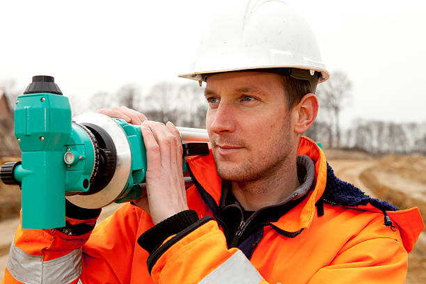 istock Land surveyor on construction site The Netherlands 183760783