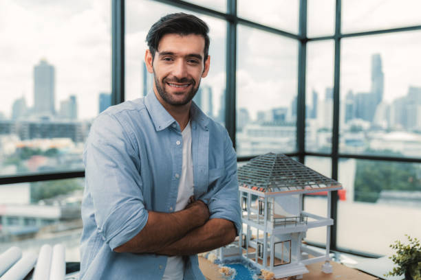 istock Portrait of skilled engineer smiling at camera while crossing arms. Tracery. 1837613669