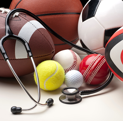Sports balls for a number of different sports with stethescope