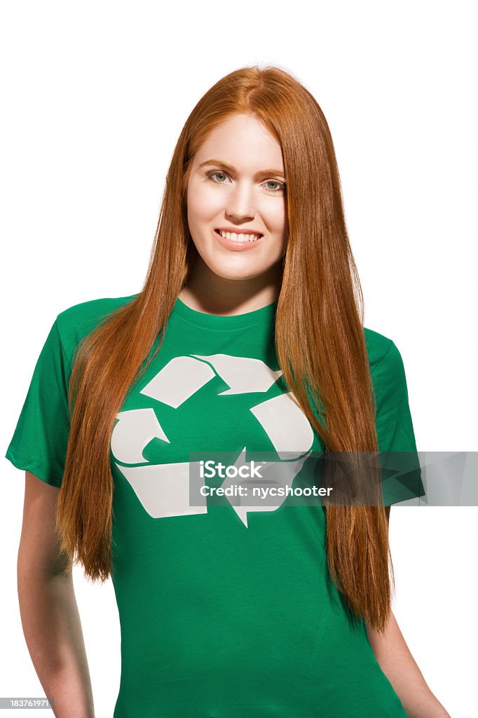 Young environmentally friendly girl Young attractive woman wearing a recycling logo t-shirt. T-Shirt Stock Photo
