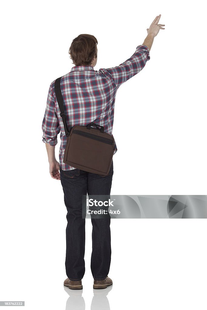 Vista traseira de um homem apontando com o dedo indicador - Royalty-free Fundo Branco Foto de stock