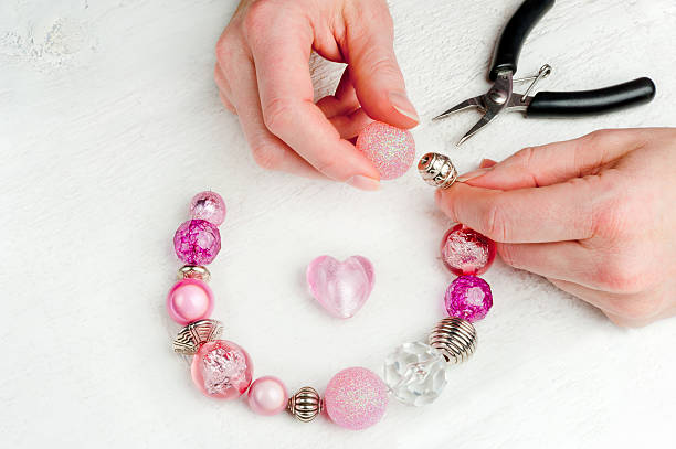 home made bead jewelry making as a hobby stock photo