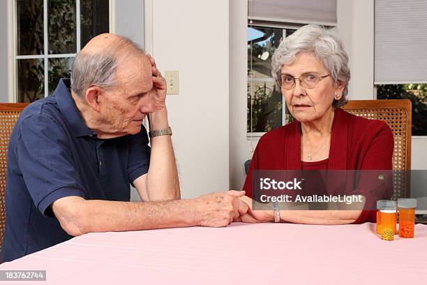 Alzheimers Woman Holds Husbands Hand Stock Photo - Download Image Now - Alzheimer's Disease, Medicine, 70-79 Years