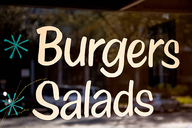 istock Burgers and Salads written on a cafe window. 183763536