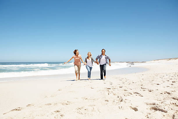 istock Family having fun at beach 183764316