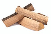 Stack of three cut logs with bark