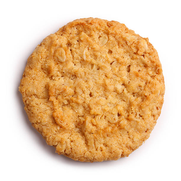 anzac biscuit isolé tracé de détourage - isolated on white baked bakery biscuit photos et images de collection