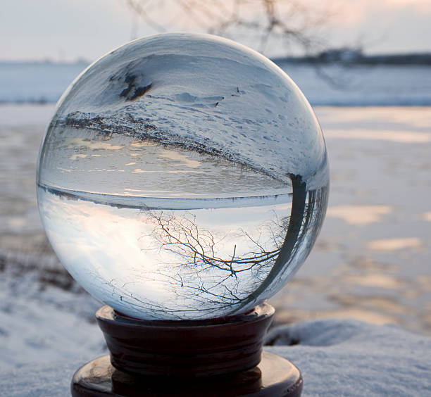 ice crystals Glass ball on the banks of a frozen pond snow globe empty silhouette stock pictures, royalty-free photos & images