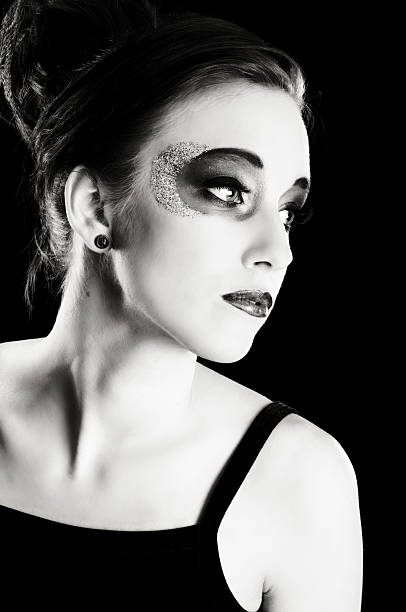 istock B&W profile of model in glamour makeup. 183764901