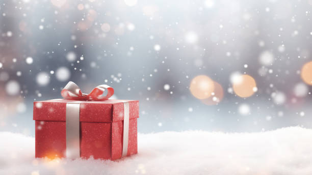 istock Red Gift Box in Snow with Bokeh Background 1837651394