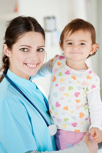istock Pediatrician with baby. 183765618