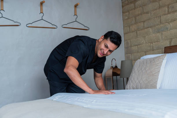 istock Latin man cleaning assistant of a beautiful cabin is inside it performing his designated duties 1837660268