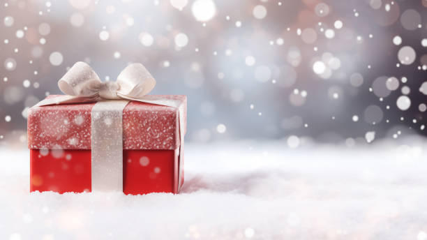 istock Sparkling Red Gift Box in Snowy Scene 1837660523