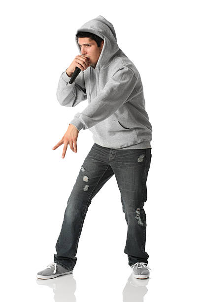 istock Isolated white boy dropping rap lyrics with microphone 183766195