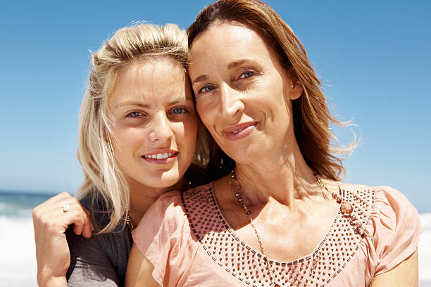 istock Mother and daughter smiling 183766277