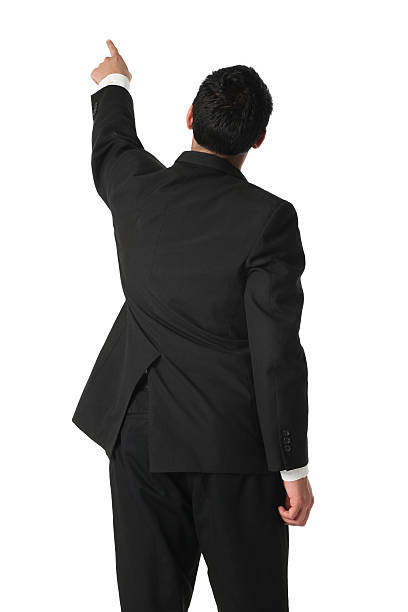istock Rear view of a businessman pointing 183766465