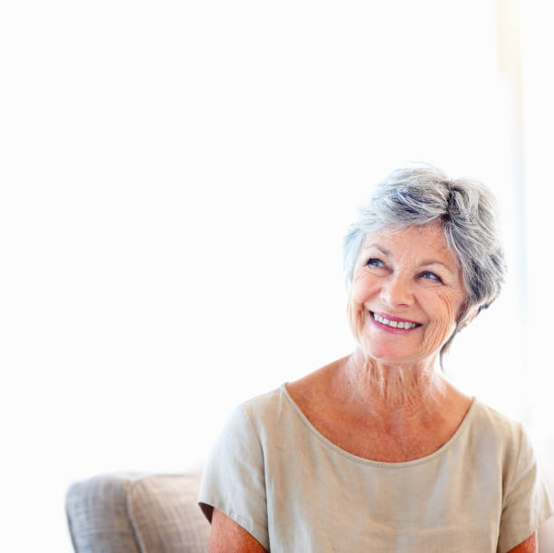 istock Senior woman day dreaming 183766906