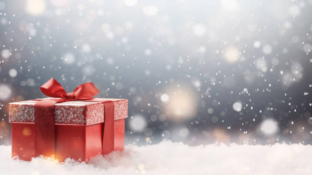 istock Sparkling Red Gift Box in Snowy Scene 1837673655