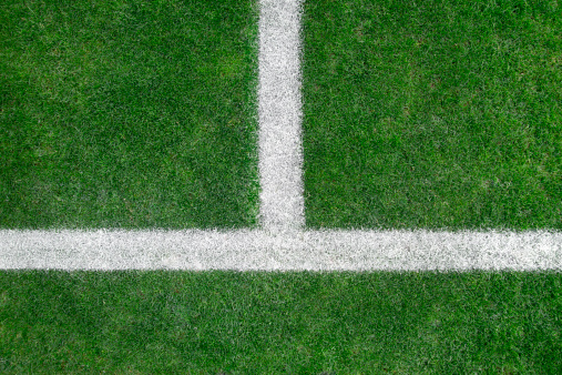 white lines on an artificial grass soccer field