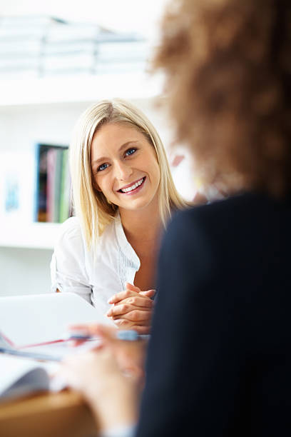 istock Smiling business woman at workplace 183768168