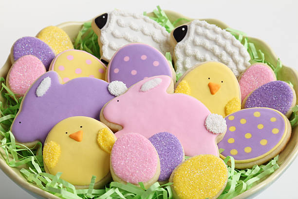 Plate of Easter Cookies "XXXL.  Plate full of assorted decorated Easter sugar cookies.  Includes eggs, chicks, bunnies, and lambs shapes." gchutka stock pictures, royalty-free photos & images