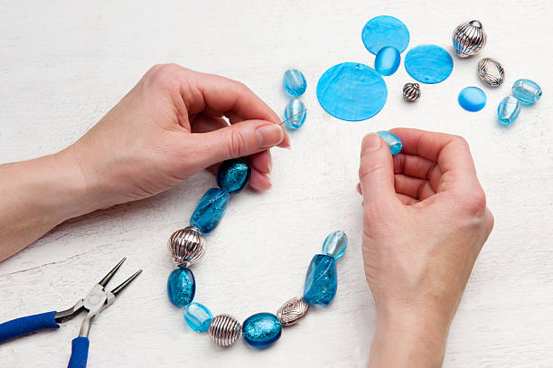 home made bead jewelry making as a hobby stock photo