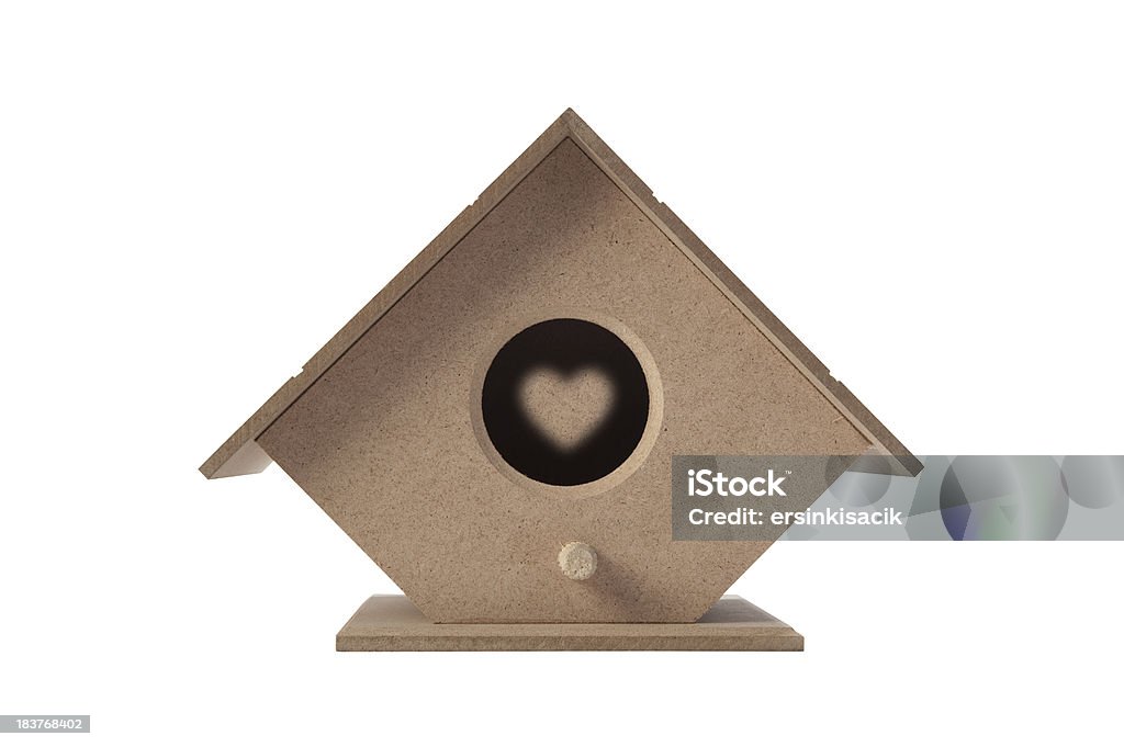 Lovely Bird House Wooden bird house isolated on white.Heart shape in house. Animal Nest Stock Photo