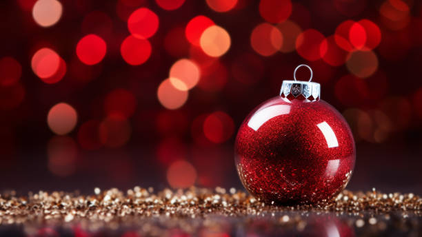 istock Sparkling Red Christmas Bauble on Bokeh Background 1837697271