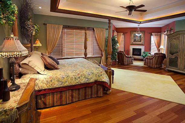 istock Spacious Master Bedroom With Sitting Area, Lighted Tray Ceiling 183769760