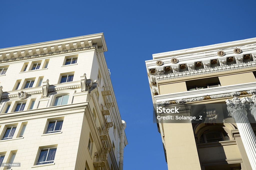 Architecture Styles Two buildings with neutral colors and beautiful architecture details. Architectural Feature Stock Photo