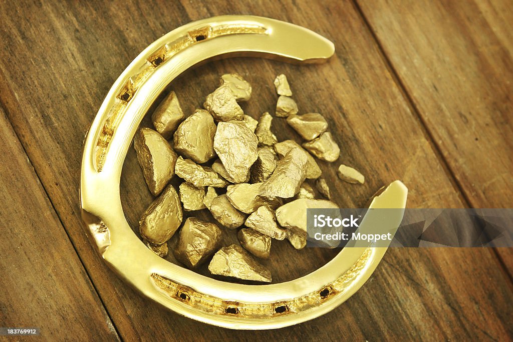 Lucky Horseshoe Horseshoe full of luck. symbol of good fortune or winnings. Gold - Metal Stock Photo