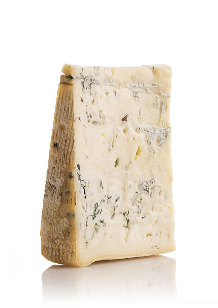 Piece of Gorgonzola Cheese (Clipping Path) Piece of Gorgonzola Cheese. Clipping Path included blue cheese stock pictures, royalty-free photos & images