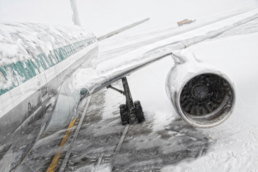 Boeing 757 covered with snow and Ice during a snowstorm.Please Also See: