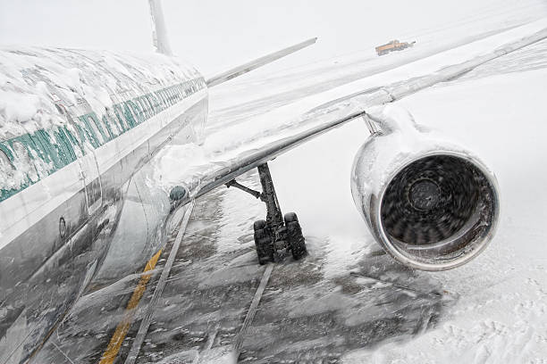 Snowstorm and air travel stock photo