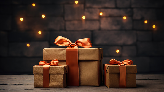 Festive Golden Gift Boxes and Bokeh Wall