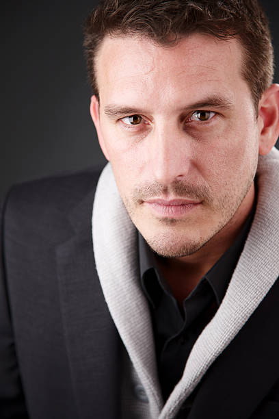 istock Portrait of man with serious expression 183770584