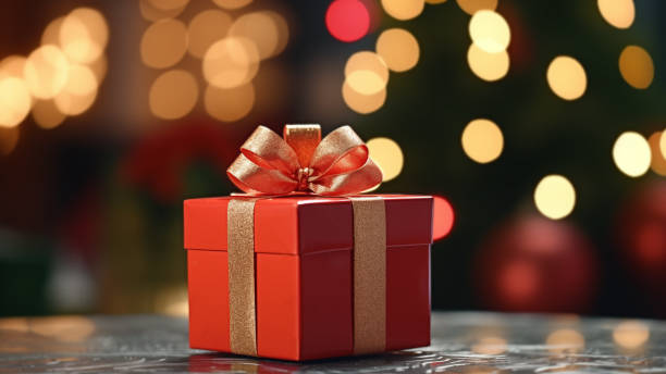 istock Festive Red Gift Box with Golden Bow and Bokeh 1837707312