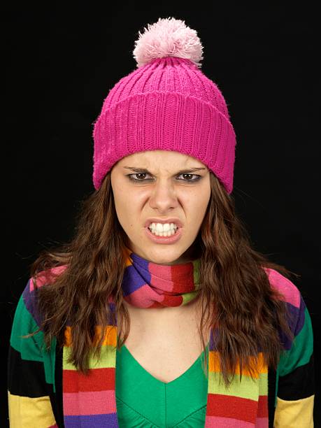 istock angry girl with colored cap 183770812