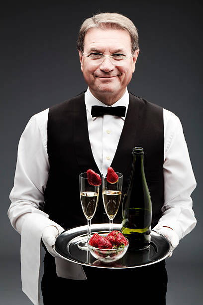 butler con champán - waiter butler champagne tray fotografías e imágenes de stock