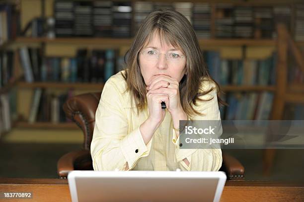 Serious Businesswoman With Laptop Stock Photo - Download Image Now - In Front Of, Anxiety, Laptop