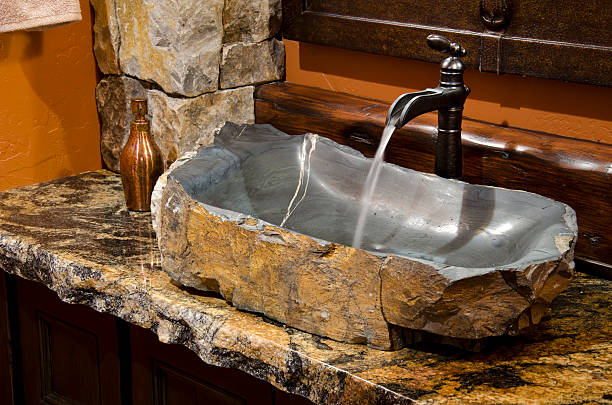 istock Bathroom sink made of rock 183771446