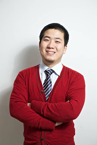 istock Businessman in red cardigan 183771471